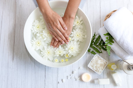 Spa beauty massage health wellness.  Spa Thai therapy treatment aromatherapy for nail and hands woman with white flower nature candle for relax and summer time.Â  Lifestyle and cosmetic Conceptの写真素材