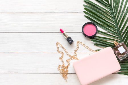 Makeup beauty cosmetic fashion set background. Cosmetics woman bag product facial, lipstick Â and items decorative composition flat lay on white background.Â  Lifestyle fashion Conceptの写真素材
