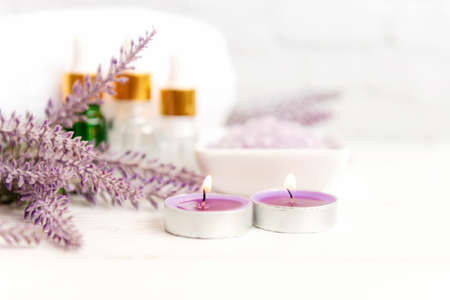 Spa beauty massage health wellness background.Â  Spa Thai therapy treatment aromatherapy for body woman with lavender flower nature candle for relax and summer time.  Lifestyle Health Conceptの写真素材