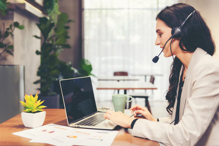 Call center and customer service team support for information operator at work.Â  People woman employee consultant and talking on hands free phone for help and service customer.の写真素材
