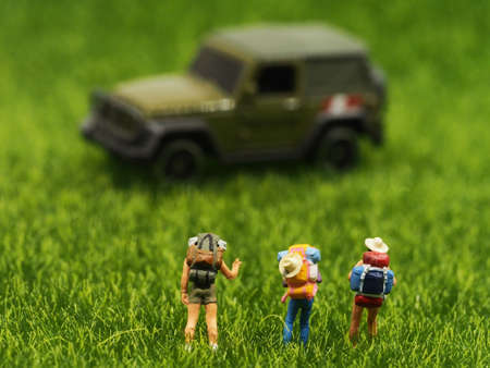 Group Miniature traveler and hiker backpack standing in the forest for the tourist and adventure around the world.  Travel Conceptの写真素材