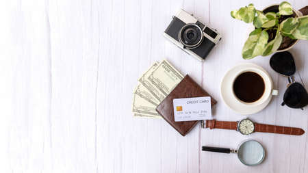 Top view of Traveler item accessories and credit card with tourism backpack and visiting for planning trips travel destination and vacations on white world, copy space.  Travel and Summer holiday conceptの写真素材