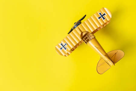 Airplane on pastel background. Travel new normal and safety life.  Tourism observance of safety on the plane. Traveling by air with medical advice on travel in holidayの写真素材