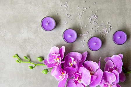 Massage Spa. Thai Spa Treatments aroma therapy salt and sugar scrub massage with purple orchid flower on backboard with candle. Thailand. Healthy Concept.の写真素材