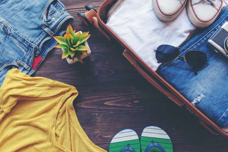 Traveler accessories and items man with tourism backpack and visiting for planning trips travel destination and vacations on the world, top view. Travel and Summer holiday conceptの写真素材