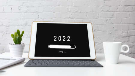 Loading year 2022 for start new business and new life. Waiting for new year.  Copy space for text.  Brick white background.の写真素材