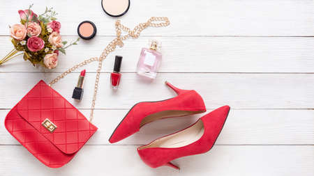 Fashion and beauty.  Fashion bag and shoe woman accessories pastel background. Trendy fashion luxury handbag, shoe, perfume and cosmetic design with rose flowerの写真素材