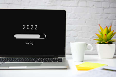 Loading year 2022 for start new business and new life. Waiting for new year.  Copy space for text.  Brick white backgroundの写真素材