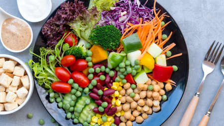 Diet and healthy fresh salad and vegetable for detox body slim fit for health lifestyle people,  backboard background.Â  Weight Loss and Diet Conceptの写真素材