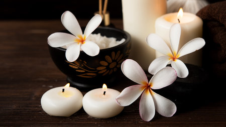 Thai spa massage.  Spa treatment cosmetic beauty. Therapy aromatherapy for care body women with candles for relax wellness. Aroma and salt scrub setting ready healthy lifestyleの写真素材