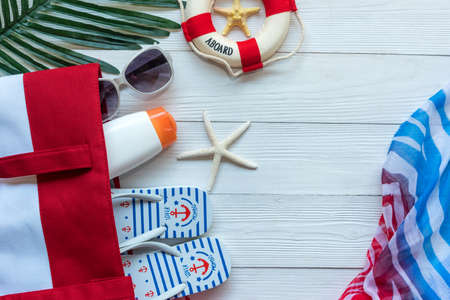 Summer Fashion woman big hat and sunblock with accessories item go to travel in the beach. Tourism...
