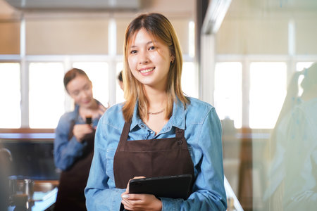 Group of woman learning in education workshop for classes barista coffee in cafe academyの写真素材