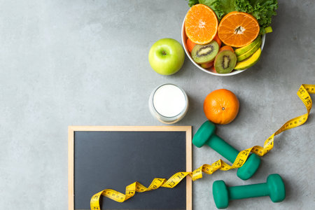 Diet and Healthy life loss weight exercise Concept. Fresh fruits salad vegetable with Weight scale measure prevention for women diet slimming. Lifestyle Time and Healthyの写真素材
