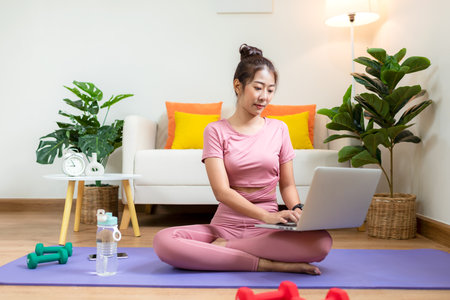 Healthy lifestyle young woman fitness gym for body slim. Young people girl exercise at living room on line. Fitness instructor exercising the fitness. Diet and Healthy sport Conceptの写真素材