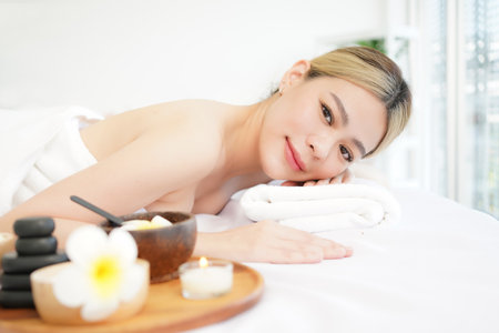 Spa beauty massage healthy wellness.  Spa Thai therapy treatment aromatherapy for body woman. Young woman enjoying and relax massage in spa salon. Lifestyle and Cosmetic Healthy Conceptの写真素材