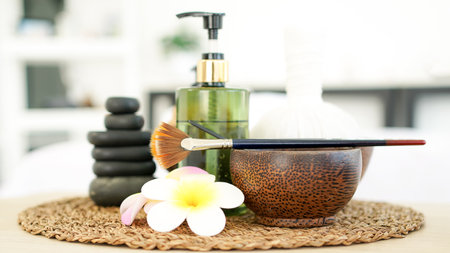 Thai spa massage. Spa treatment cosmetic beauty. Therapy aromatherapy for care body women with candles for relax wellness. Aroma and salt scrub setting ready healthy lifestyleの写真素材