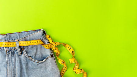 Planning for dieting healthy. Measure tape around waist jean for diet health.  Healthy Lifestyle...