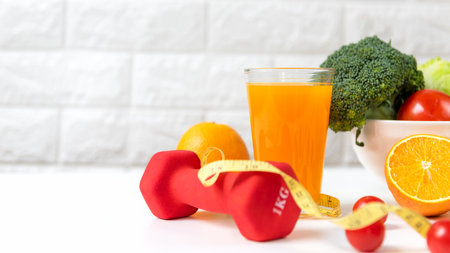 Diet and healthy fresh vegetable for detox body slim fit for health lifestyle with Sport exercise equipment workout and milk. Weight Loss and Diet Conceptの写真素材