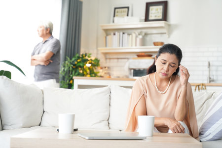 Asia senior elderly couple having problems relationship.Â  Family after elderly concerned about healthy care.Â  Family and Health care Conceptの写真素材