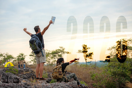 The start into the new year 2026. Group people tourist raise arm relax in tent after activity outdoor for destination leisure and go to goal success new yearの写真素材