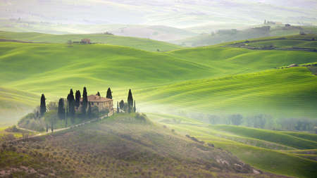 Tuscany farmhouse on hillの写真素材