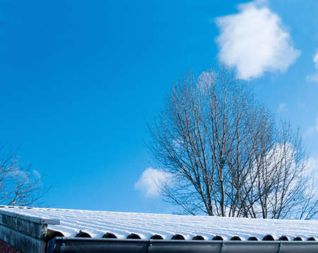 Winter time - Snow on rooftops wth copyspaceの写真素材