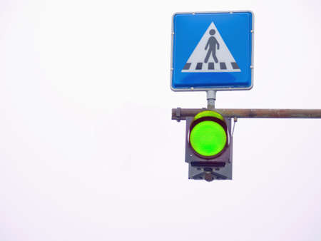 Go light showing green at a pedestrian  crossingの写真素材