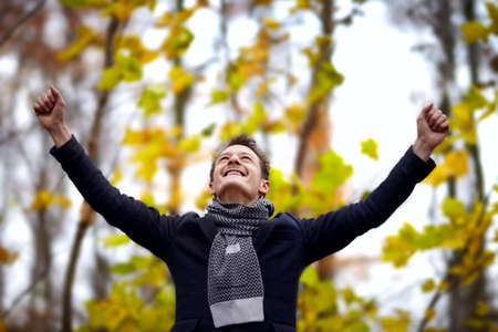WINNER - Successful young man showing his successの写真素材