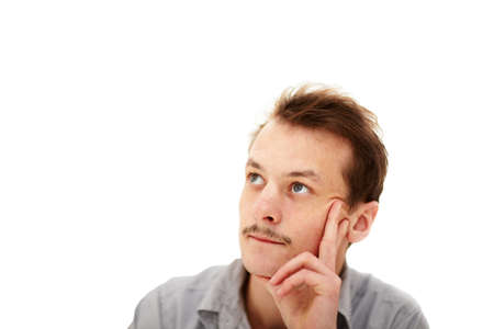 Contemplation - young man thinking with copyspace