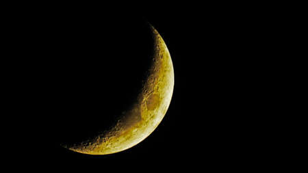 Young Moon on dark sky. Zoomed by 83xの写真素材