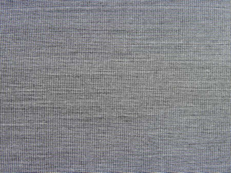 Monotone texture in cold colors of the textile.