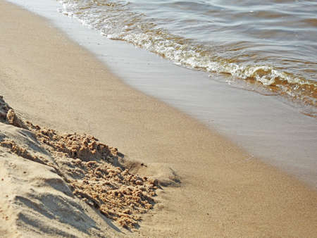 Soft wave of blue ocean on sandy beach. Background.の写真素材