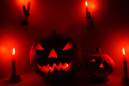 Halloween pumpkin head jack lantern with scary evil faces spooky holidayの写真素材