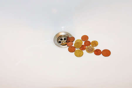 Abstract idea of paying money for waterの写真素材