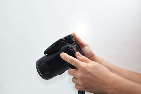 Making photos abstraction. Camera isolated on white background.の写真素材