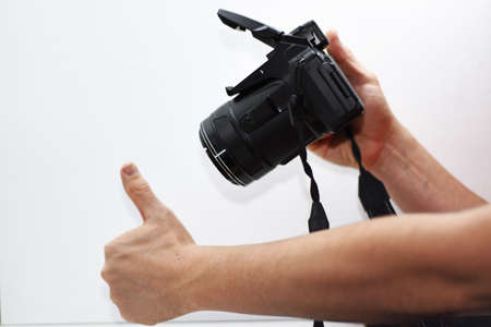 Making photos abstraction. Camera isolated on white background.の写真素材