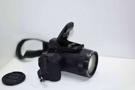 Making photos abstraction. Camera isolated on white background.の写真素材