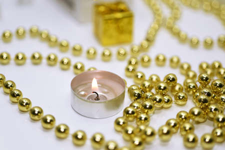 Golden Christmas decoration. Isolated on white background.の写真素材