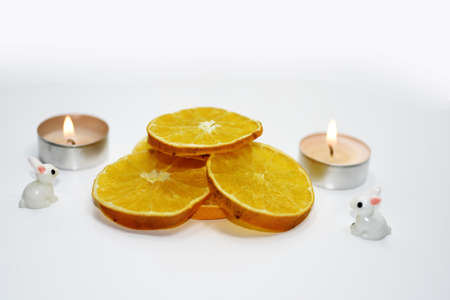 Abstract decoration of Christmas dry oranges. Isolated on white background.の写真素材
