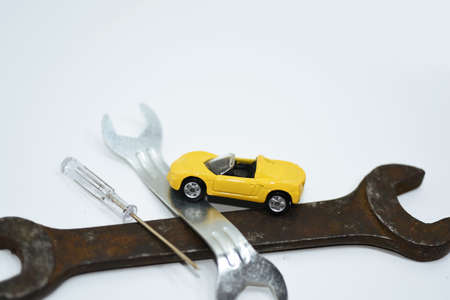 Abstract composition of broken car and repair process.の写真素材