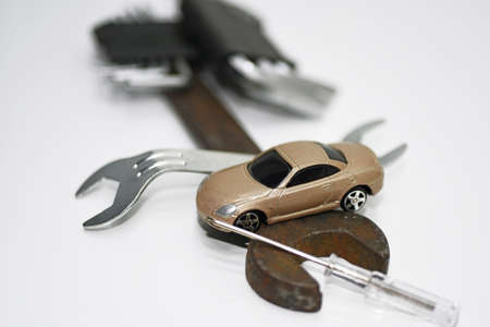 Abstract composition of broken car and repair process.の写真素材