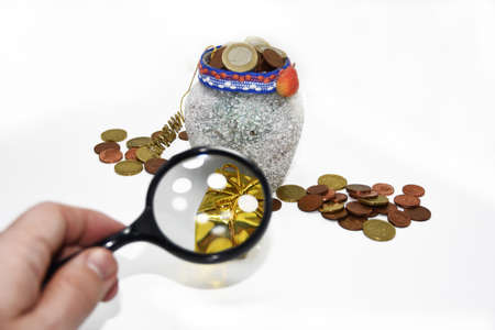 Christmas pot with euro coins isolated on white background.の写真素材