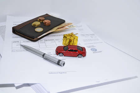 Abstract composition of car documents. Isolated on white background.の写真素材