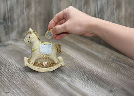 Moneybox in the form of a horse.の写真素材