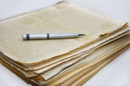 Old books with pen. Isolated documents