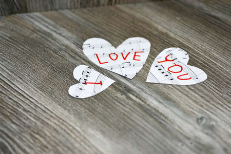Phrase I love You on music sheets.
