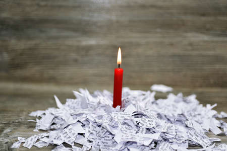 Red candle in broken love abstraction.の写真素材