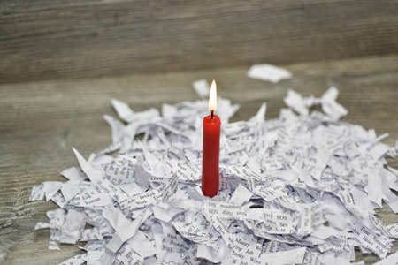 Red candle in broken love abstraction.の写真素材
