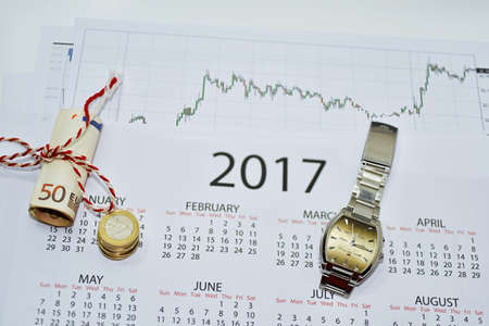 Abstract composition of making year plans. Mans arm with 2017 calendar.の写真素材