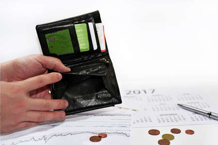 Empty black pocket with no money.